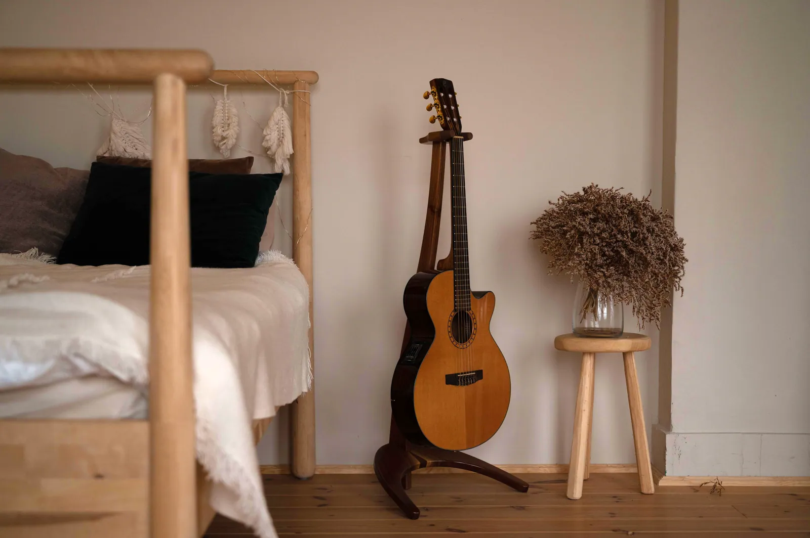 FormaStand beside a bed