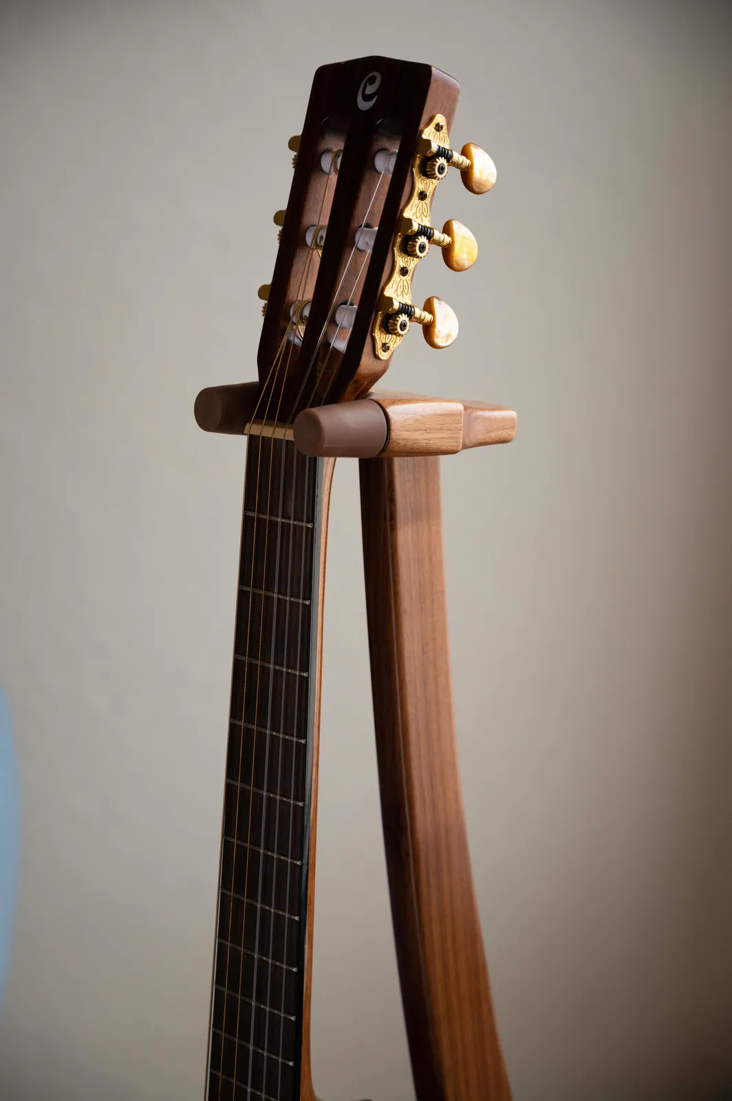 Detail of the cradle holding a guitar neck