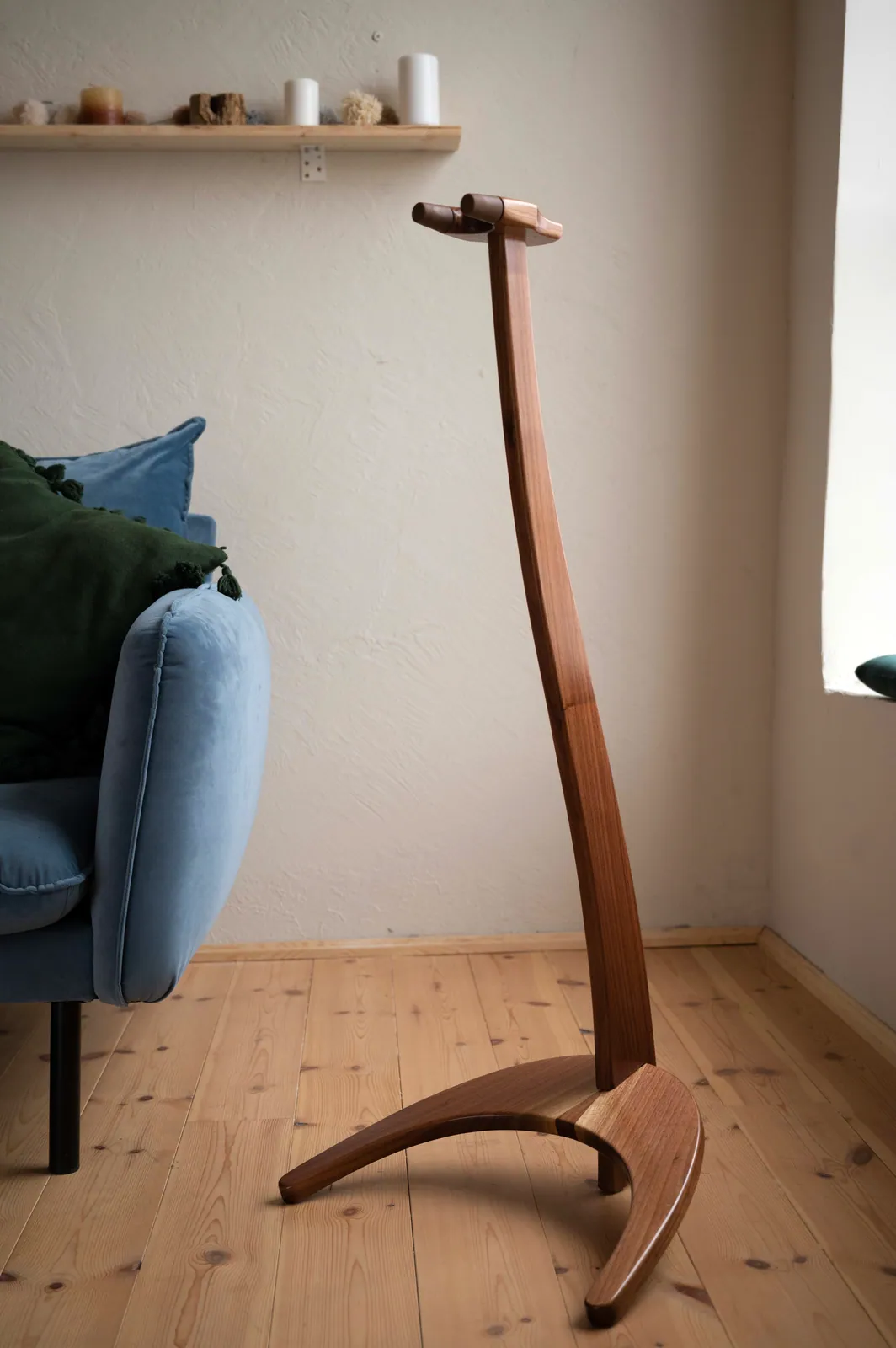 Solid walnut FormaStand One, empty, standing in a calm room